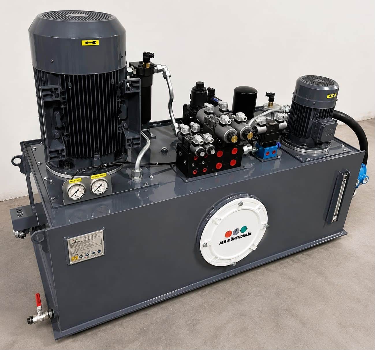 Hydraulic power unit manufactured by AEB Engineering — dual-motor, manifold-blocked high-flow industrial system