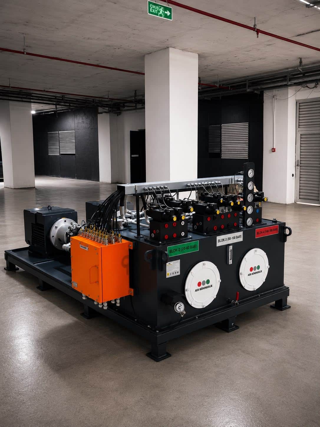 Custom hydraulic power unit manufactured by AEB Engineering — multi-pressure stage manifold blocks and integrated electrical panel system